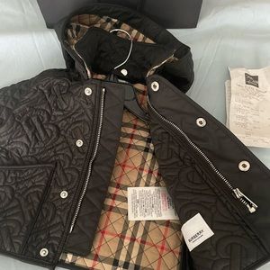 Brand new never been worn Burberry baby jacket with detachable hood.